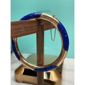 Vintage 14k yellow gold lapis lazuli bangle